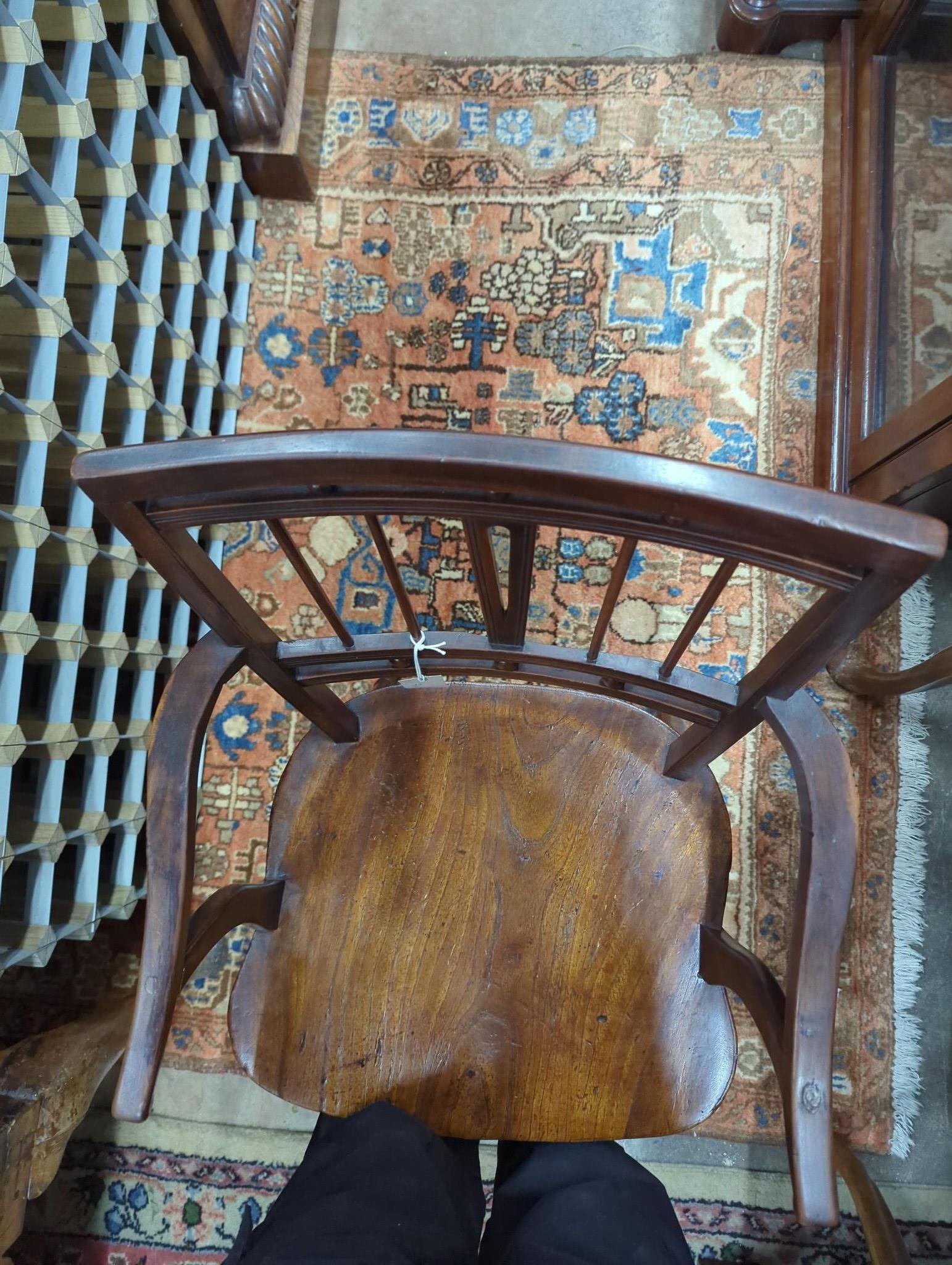 A mid 19th century elm and fruitwood Mendlesham elbow chair by Richard Day, width 48cm, depth 40cm, height 84cm